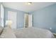 Cozy bedroom featuring soft colors, neutral tones and comfortable furnishings at 3433 Brouse Ave, Indianapolis, IN 46218
