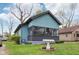 Charming home featuring a decorative bird bath, and a lovely lawn at 3433 Brouse Ave, Indianapolis, IN 46218