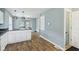 Kitchen area with stainless steel appliances and an easy flow into other living areas of the home at 3433 Brouse Ave, Indianapolis, IN 46218