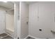 Laundry room area featuring washer/dryer hookups and access to a tiled shower at 3703 Dubarry Rd, Indianapolis, IN 46226
