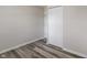 This bedroom has hard surface floors, and closet with bi-fold doors at 3703 Dubarry Rd, Indianapolis, IN 46226