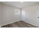This bedroom features a closet with bi-fold doors, and one window at 3703 Dubarry Rd, Indianapolis, IN 46226