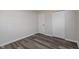 This bedroom features a closet and a door at 3703 Dubarry Rd, Indianapolis, IN 46226