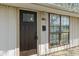 Inviting front entrance featuring a dark wooden door and large window, creating a warm welcome at 3703 Dubarry Rd, Indianapolis, IN 46226