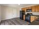 Well-lit kitchen with modern flooring and appliances, creating a cozy cooking environment at 3703 Dubarry Rd, Indianapolis, IN 46226