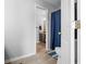 View through the doorway of a simple, elegant bathroom with wood floors and fixtures at 376 Lake Ridge Ln, Greenwood, IN 46142