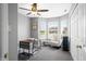 Inviting bedroom features a chair, desk, carpet, ceiling fan, and lots of light at 376 Lake Ridge Ln, Greenwood, IN 46142