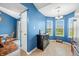 Bright breakfast nook features large windows, tile floors, and blue accent walls at 376 Lake Ridge Ln, Greenwood, IN 46142