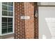 Close-up of home address with brick facade and window at 376 Lake Ridge Ln, Greenwood, IN 46142