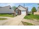 Attractive home with a well-kept lawn and paved driveway at 376 Lake Ridge Ln, Greenwood, IN 46142