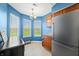 Modern kitchen features stainless steel appliances, tile flooring, and natural light at 376 Lake Ridge Ln, Greenwood, IN 46142