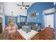 Cozy living room with fireplace, vaulted ceiling, and hardwood floors at 376 Lake Ridge Ln, Greenwood, IN 46142