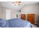 This bedroom features an ensuite bathroom, natural lighting, and ample closet space at 376 Lake Ridge Ln, Greenwood, IN 46142