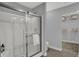 Modern bathroom featuring a glass enclosed shower with sleek fixtures and a convenient towel bar at 4105 Ashton View Ln, Indianapolis, IN 46268