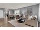 Open-concept living and dining areas, with modern decor and plenty of natural light at 4105 Ashton View Ln, Indianapolis, IN 46268
