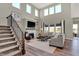 Bright and airy living room with fireplace, comfortable seating, and large windows at 4330 Persian St, Greenwood, IN 46143