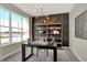 Bright and stylish study with a large window, dark wood desk, and modern decor at 4330 Persian St, Greenwood, IN 46143