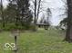 Sprawling backyard offers plenty of room to roam and explore at 4491 W Stones Crossing Rd, Greenwood, IN 46143