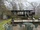 Backyard of home with large deck and seating area, perfect for enjoying the outdoors at 4491 W Stones Crossing Rd, Greenwood, IN 46143