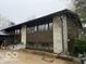 Exterior of house with stone features and a large picture window at 4491 W Stones Crossing Rd, Greenwood, IN 46143