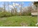 Spacious backyard with shed and mature trees at 4505 Phoenix Dr, Indianapolis, IN 46241