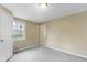 A bedroom showcasing a window and a doorway at 4505 Phoenix Dr, Indianapolis, IN 46241