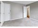 A bedroom featuring two doors at 4505 Phoenix Dr, Indianapolis, IN 46241