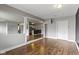 Cozy living room featuring gray walls and hardwood flooring, ideal for relaxing and entertaining guests at 4505 Phoenix Dr, Indianapolis, IN 46241