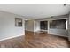 Spacious living room featuring gray walls and hardwood flooring, perfect for relaxation and entertainment at 4505 Phoenix Dr, Indianapolis, IN 46241