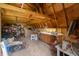Barn interior with a workbench, storage shelves, and plenty of space for projects or storing equipment at 5510 Chelsea Rd, Indianapolis, IN 46241