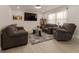 Inviting living room features neutral tones, comfortable seating, and abundant natural light at 5510 Chelsea Rd, Indianapolis, IN 46241