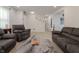 Spacious living area showcases modern furnishings and a seamless flow throughout the home at 5510 Chelsea Rd, Indianapolis, IN 46241