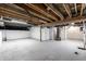 Unfinished basement with exposed ceiling, ready to be transformed into a personalized living space at 5516 S Randolph St, Indianapolis, IN 46227