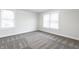 Well-lit bedroom with clean lines, featuring natural light, new carpet, and comfortable living at 5516 S Randolph St, Indianapolis, IN 46227