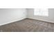 Clean bedroom with neutral carpet, offering a blank canvas for personalization and comfort at 5516 S Randolph St, Indianapolis, IN 46227