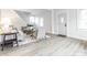 Spacious living room with a staircase, light wood floors, and neutral decor for a cozy atmosphere at 5516 S Randolph St, Indianapolis, IN 46227
