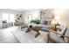 Open living room with ample seating, modern decor, and plenty of natural light at 5516 S Randolph St, Indianapolis, IN 46227