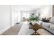 Bright living room with sofa, chairs, and natural light at 5516 S Randolph St, Indianapolis, IN 46227