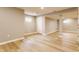 Open basement area featuring vinyl flooring, white painted walls and recessed lighting at 559 Hythe Way, Westfield, IN 46074
