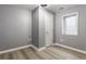 Finished basement showing a door and a window for natural light at 559 Hythe Way, Westfield, IN 46074