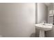 Bathroom featuring a pedestal sink and neutral wall color at 559 Hythe Way, Westfield, IN 46074