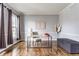 Home office with hardwood floors, neutral paint, modern desk, and natural light at 559 Hythe Way, Westfield, IN 46074