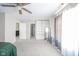 Spacious main bedroom with a ceiling fan, built-in shelving, and walk-in closet at 5820 Marble Ct, Anderson, IN 46013
