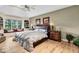 Cozy primary bedroom featuring a window seat with built-in bookshelves and natural light at 5861 Dawnwood Dr, Carmel, IN 46033