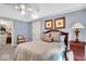 Bedroom features a vaulted ceiling, closet and adjacent seating area at 5861 Dawnwood Dr, Carmel, IN 46033