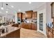 Well-equipped kitchen showcases granite countertops, custom cabinetry, and modern appliances at 5861 Dawnwood Dr, Carmel, IN 46033