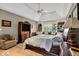 Bright main bedroom featuring a built-in window bench and custom bookshelves at 5861 Dawnwood Dr, Carmel, IN 46033