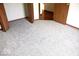 This bedroom offers plush carpeting and ample space, creating a comfortable atmosphere for relaxation and rest at 607 Deer Trail Dr, Indianapolis, IN 46217