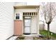 Covered front porch with brick accents and a view of the landscaped front yard at 607 Deer Trail Dr, Indianapolis, IN 46217
