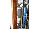 Utility room with a water heater and a water filtration system at 607 Deer Trail Dr, Indianapolis, IN 46217